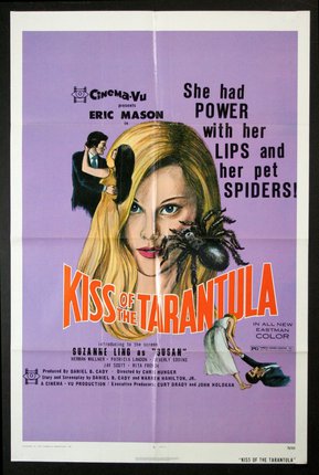 a movie poster with a woman and a spider