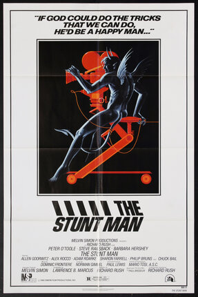 movie poster with a naked devil sitting at the controls of a movie film reel camera