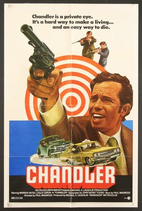 a movie poster of a man pointing a gun