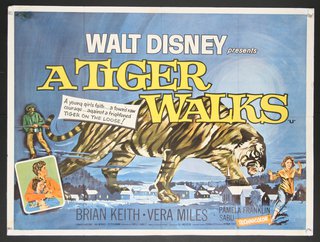 a movie poster with a tiger walking