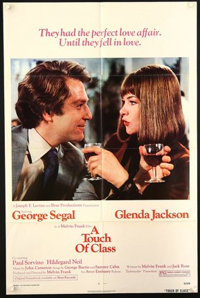 a movie poster of a man and woman holding wine glasses