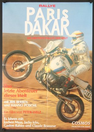 a poster with a man on a motorcycle