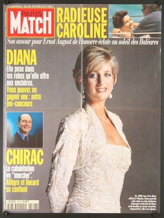 a magazine cover with a woman in a white dress