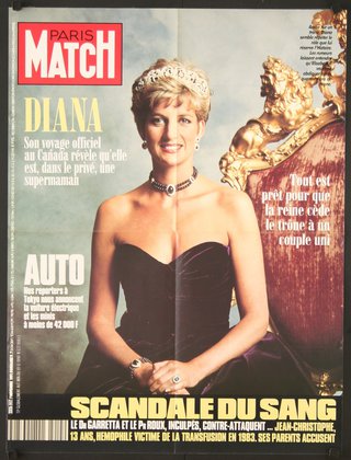 a magazine cover with a woman wearing a crown
