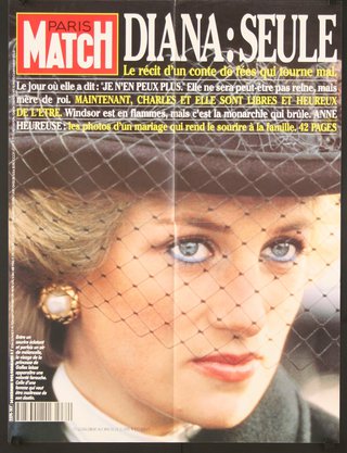 a magazine cover with a woman wearing a hat and veil