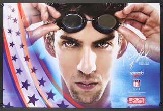 a man holding swimming goggles