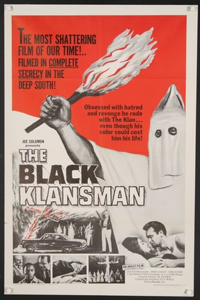a movie poster with a man holding a flambeau