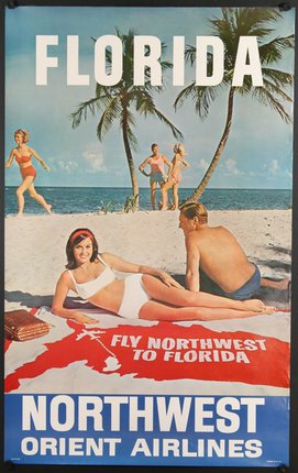 a poster of a couple on a beach