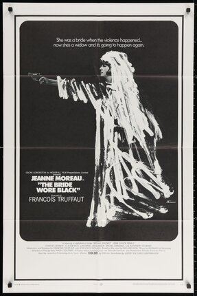 a movie poster of a woman pointing a gun