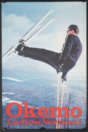 a man on skis in the air