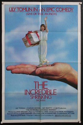 a movie poster of a woman holding a large present