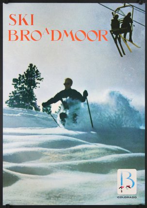 a man skiing down a snowy hill