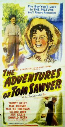 a movie poster with a boy in a straw hat
