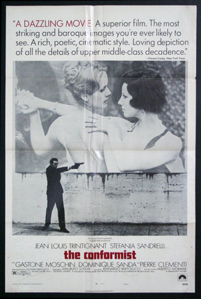 a movie poster of a man pointing at two women