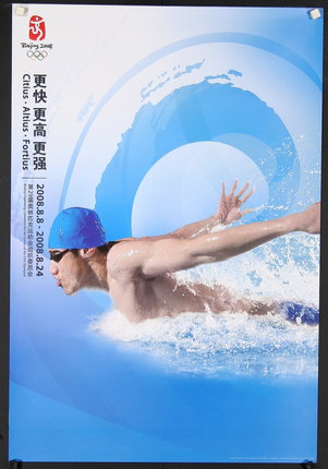 a poster of a man swimming