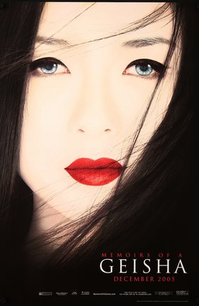 a woman with long black hair and red lipstick