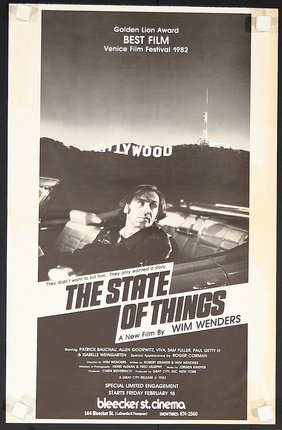 a movie poster of a man in a convertible