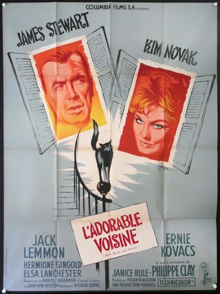 a movie poster with a couple of men and a cat