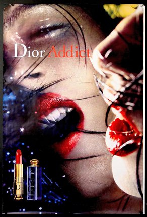 a poster of a woman's lips and lipstick