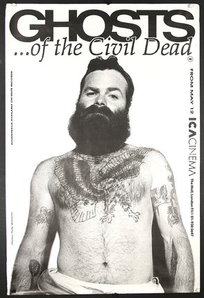 a man with a beard and a tattoo on his chest