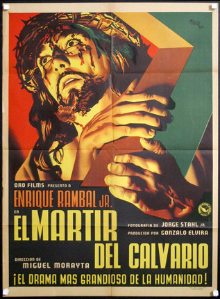 a movie poster of a man holding a cross