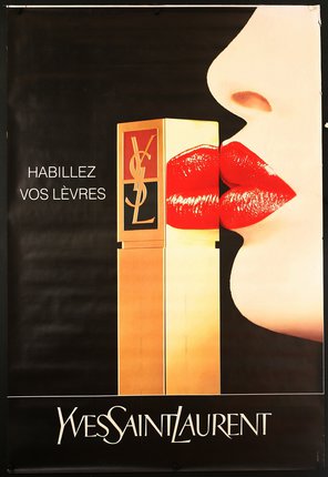 a poster of a woman's lips and a box of lipstick
