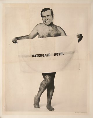 a man holding a towel