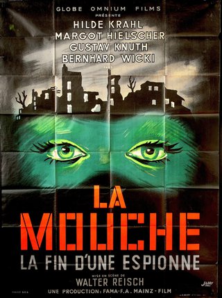 a movie poster with a green face and buildings