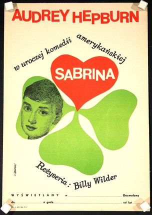 a poster with a face and four leaves