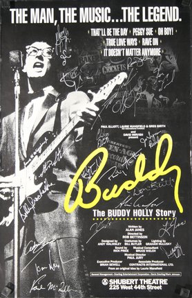 a poster with a man holding a guitar and a microphone
