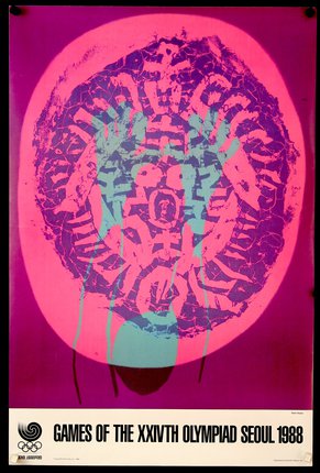 a pink and blue circular object with a person's face
