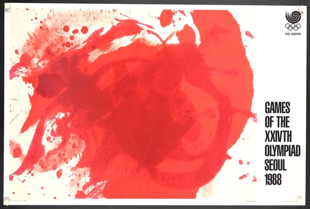 a red paint splatter on a white surface