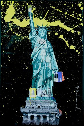 a statue of liberty with a yellow and green paint splatter