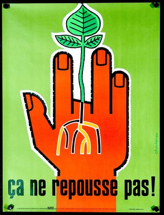 a poster with a hand holding a plant