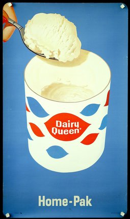 a spoon over a container of cream