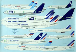 a group of airplanes with blue and white markings