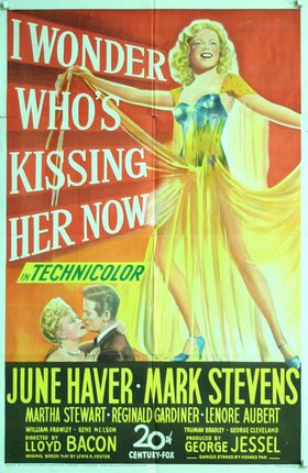 a movie poster of a woman kissing a man