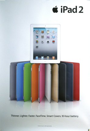 a tablet on top of several different colored cases