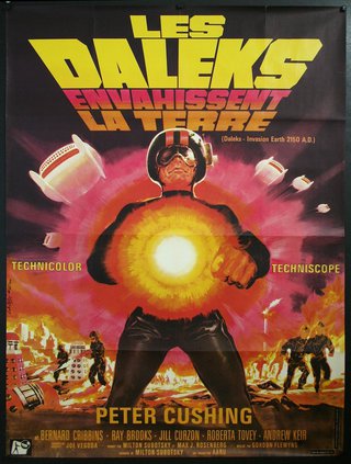 a movie poster with a man holding a glowing light