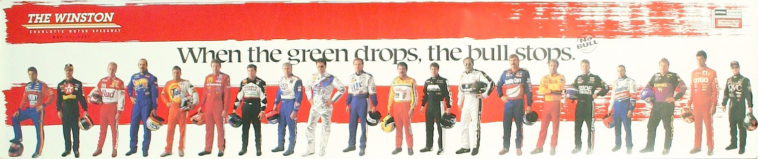 a group of men in racing suits