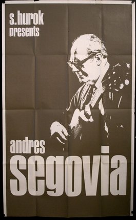 a poster of a man playing guitar
