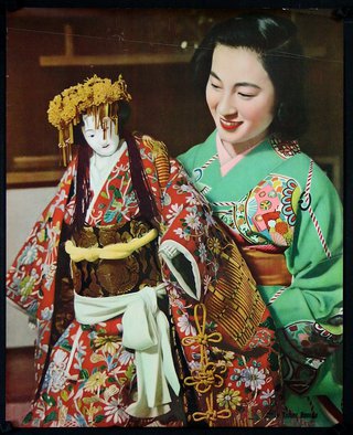 a woman in traditional japanese clothing