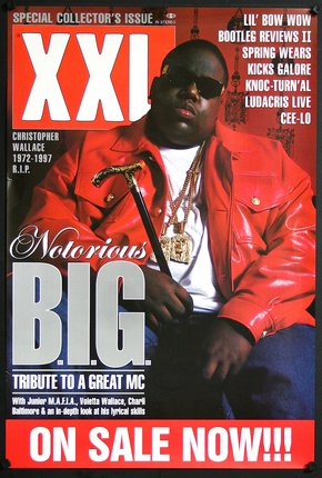 a man wearing a red jacket and sunglasses