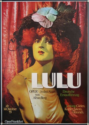 a poster with a woman with red hair and a hat