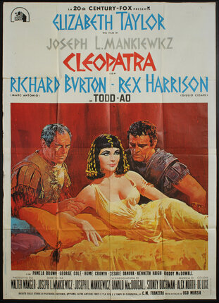 a movie poster of a woman lying on a bed with a man and a woman