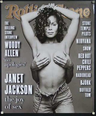 A woman on a magazine cover her breast are being covered by hands coming from behind her.