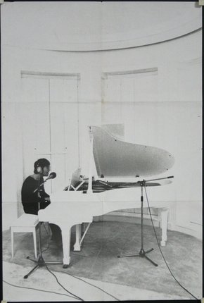 a man playing a piano