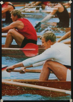a group of men rowing in a row boat