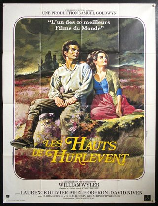 a movie poster of a man and a woman sitting on a rock