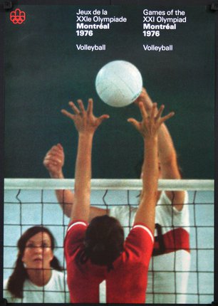 a volleyball player reaching for a ball